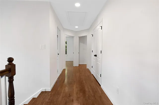 a view of entryway with wooden floor