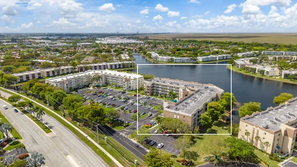 a view of a balcony with wooden floor