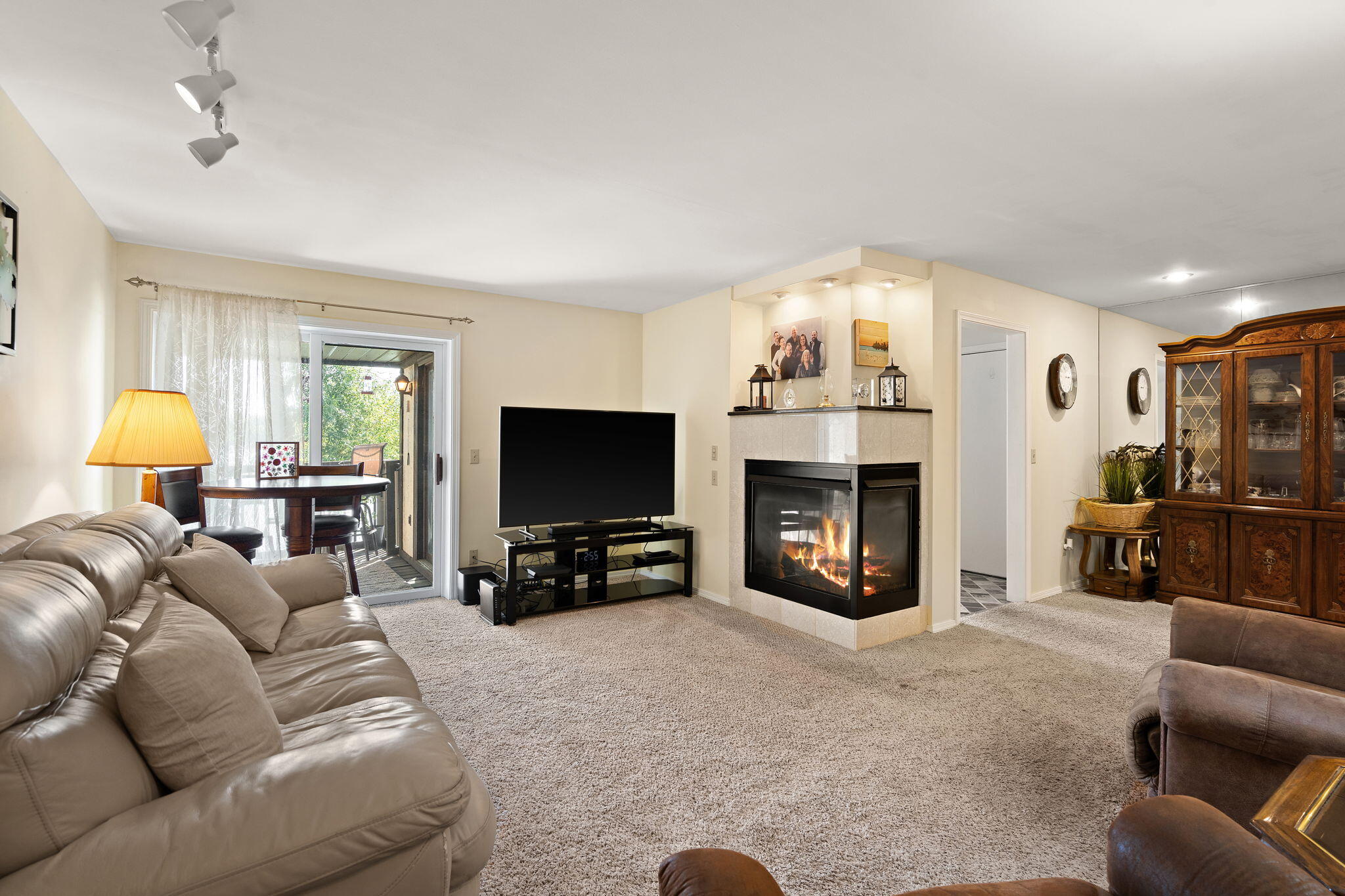 5015 Spinnaker Lane, Unit C Crown Point, IN 46307 - Photo 4 of 24 a living room with furniture and a fireplace