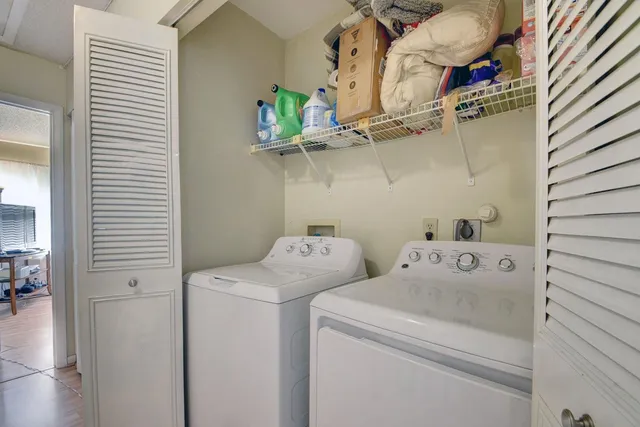 a utility room with dryer and washer