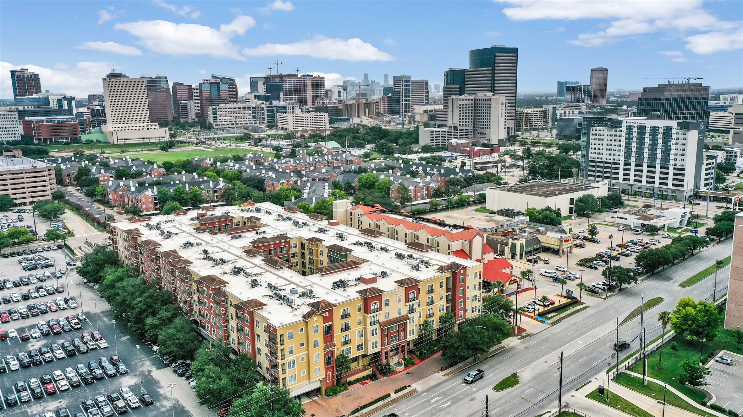 a large building with a city view