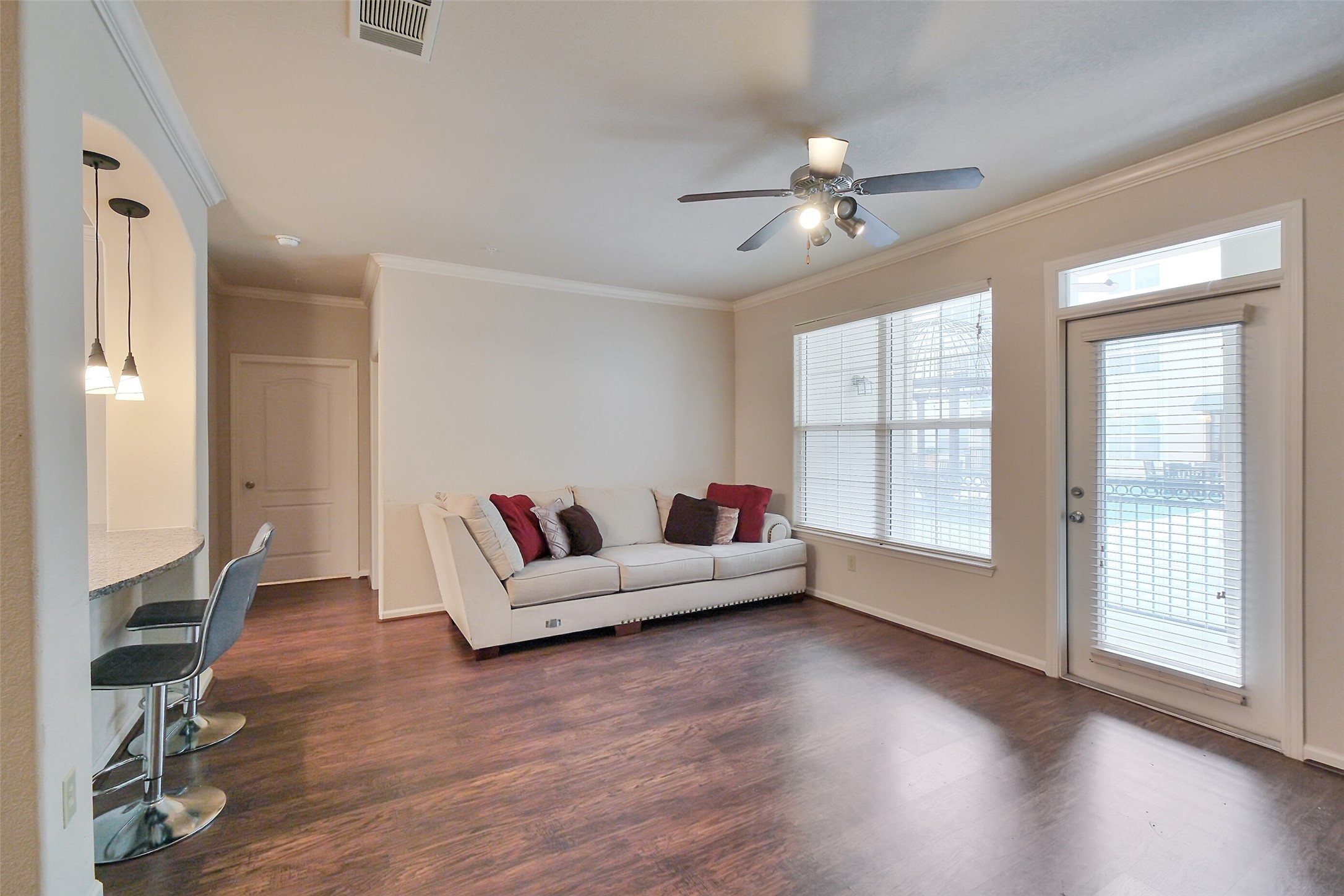 1711 Old Spanish Trail, Unit 128 Houston, TX 77054 - Photo 12 of 26 a living room with furniture and a large window