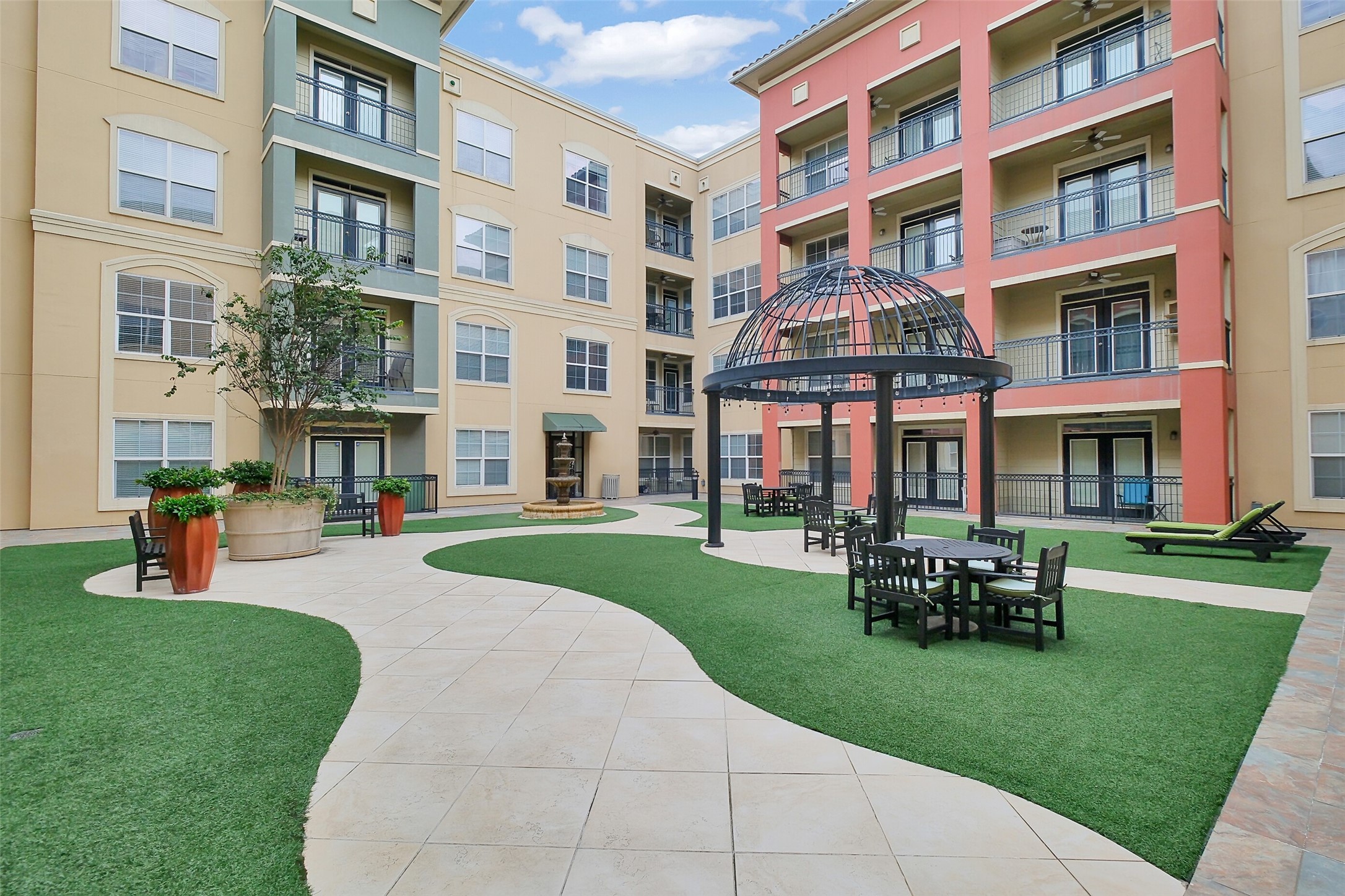 1711 Old Spanish Trail, Unit 128 Houston, TX 77054 - Photo 21 of 26 a front view of building with outdoor seating
