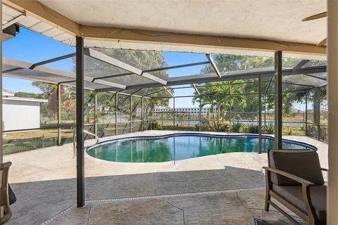 a view of outdoor space with swimming pool