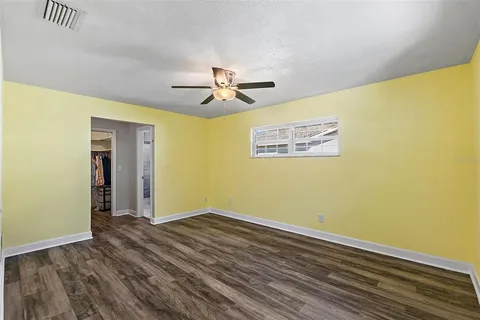 a view of a big room with wooden floor