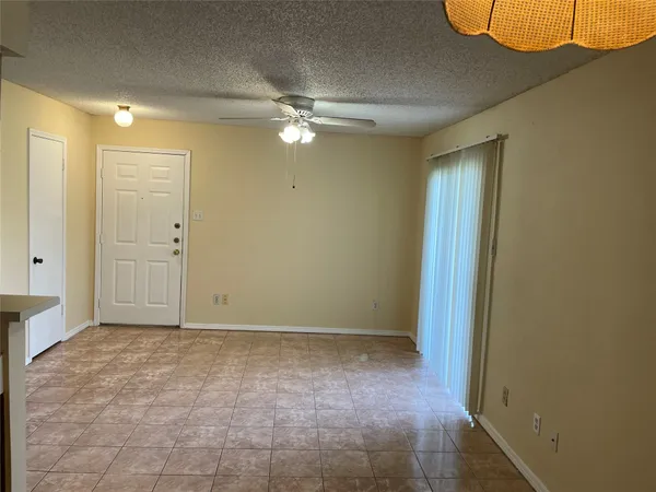 a kitchen with stainless steel appliances a refrigerator and a stove