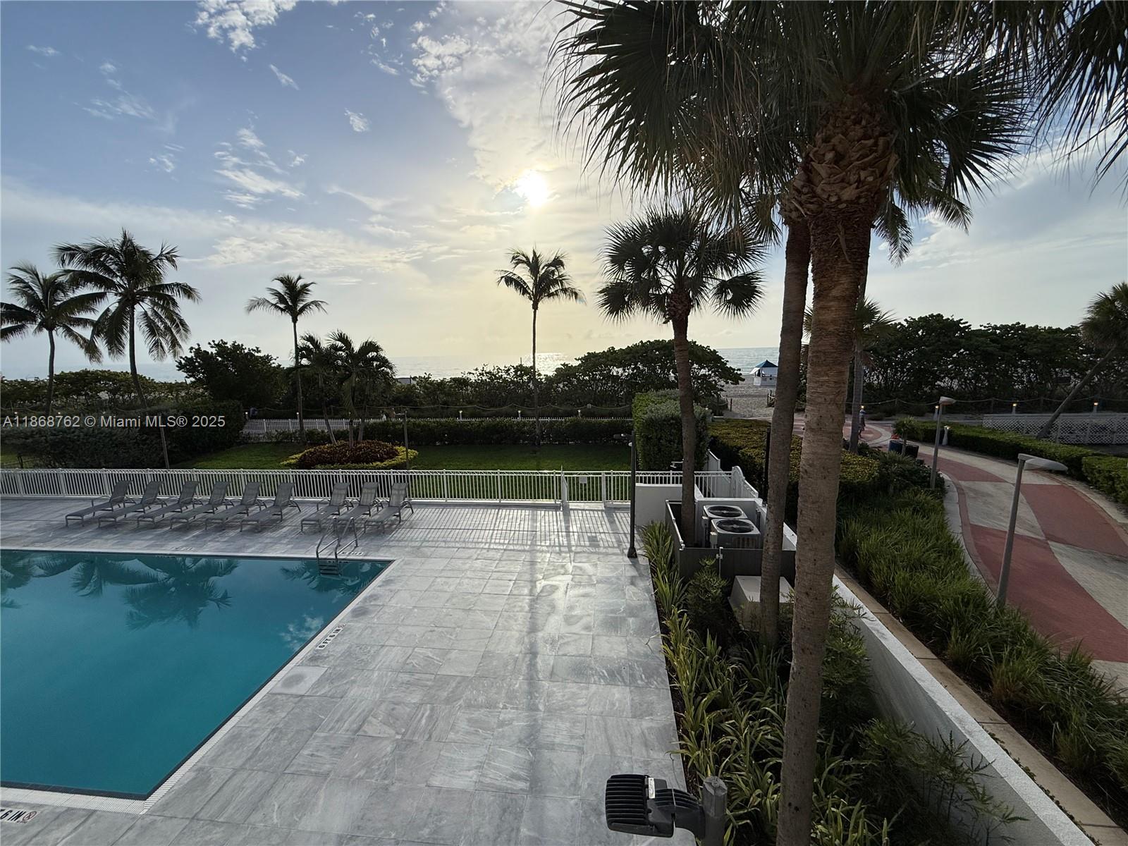 4301 Collins Avenue, Unit 208 Miami Beach, FL 33140 - Photo 21 of 28 a view of a swimming pool