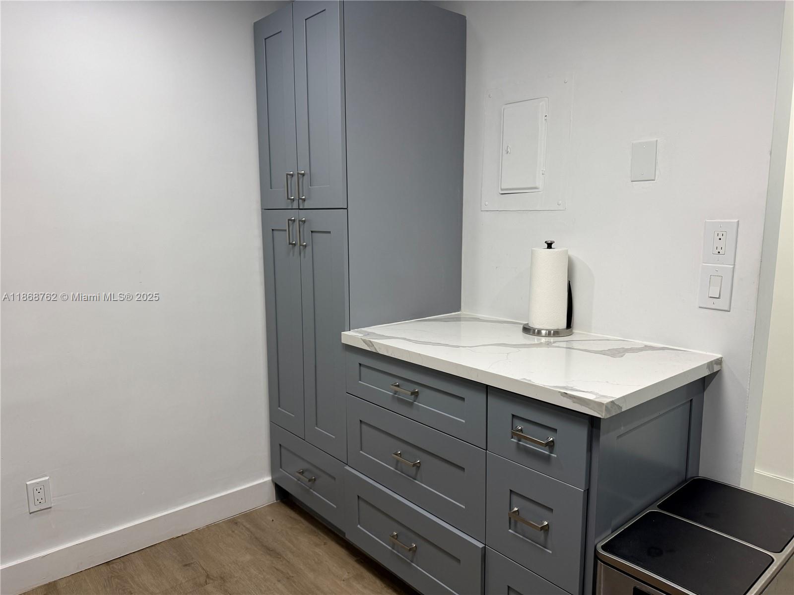 4301 Collins Avenue, Unit 208 Miami Beach, FL 33140 - Photo 6 of 28 a bathroom with a sink and a mirror