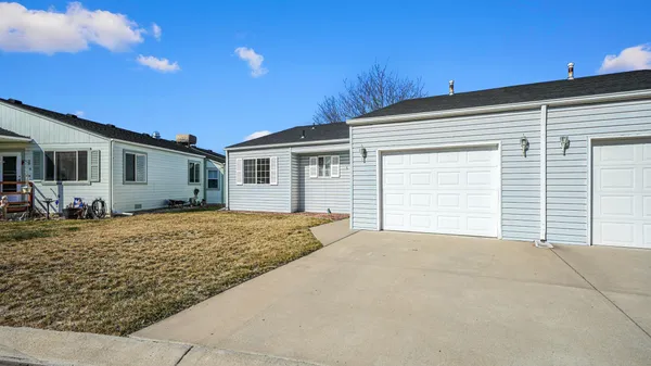 a house view with a backyard space