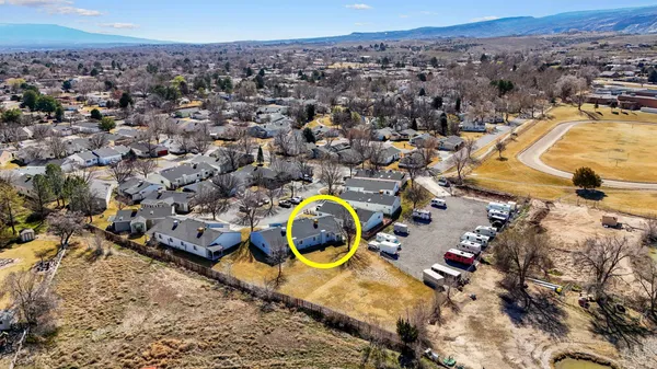 an aerial view of house with a swimming pool