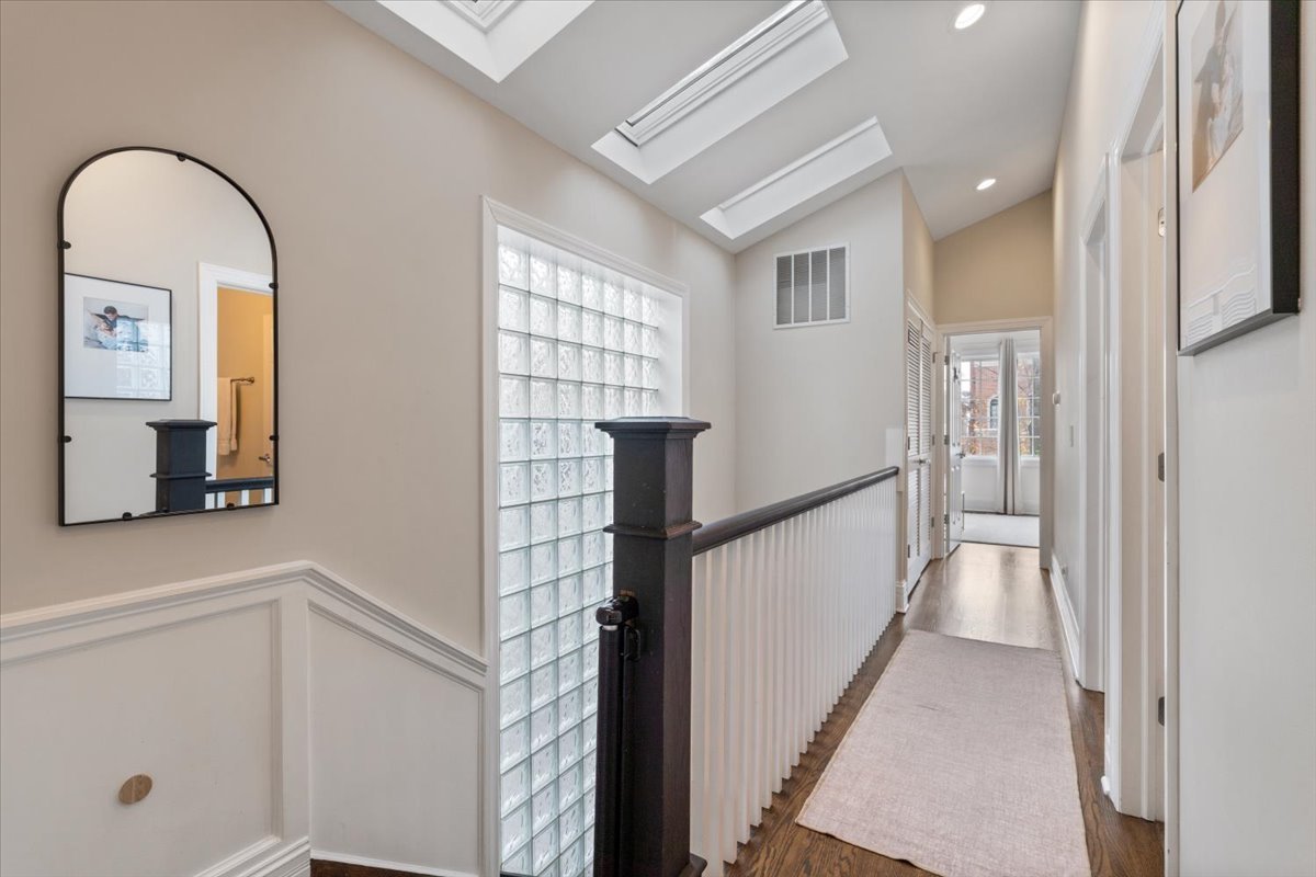 1920 West George Street Chicago, IL 60657 - Photo 17 of 36 a view of entryway with wooden floor