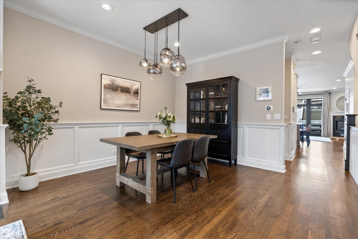 1920 West George Street Chicago, IL 60657 - Photo 8 of 36 a view of a dining room with furniture and wooden floor