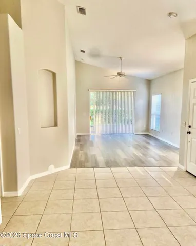 a view of an empty room and window