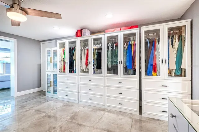 a bedroom with bed and wooden floor