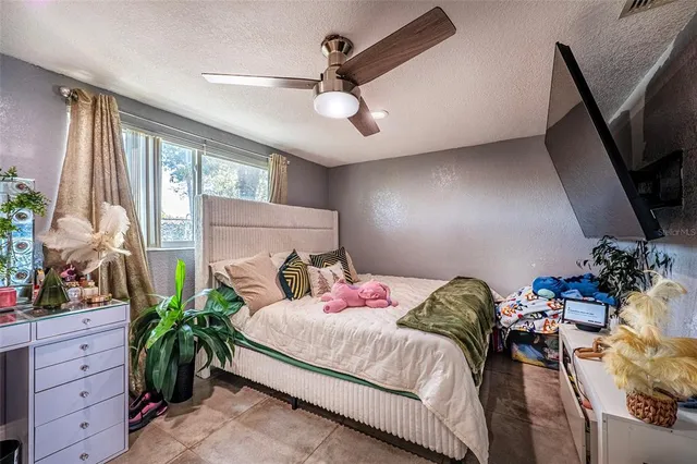 a kitchen with granite countertop white cabinets stainless steel appliances and a sink