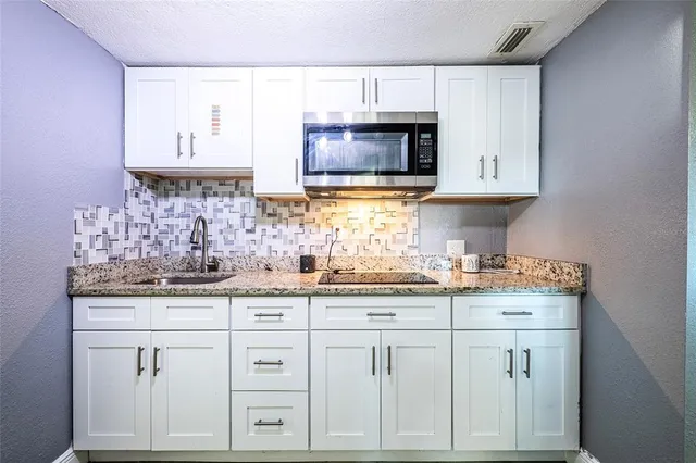 a view of a hallway with staircase