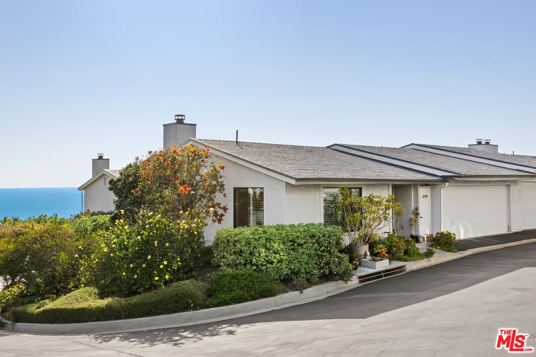 6795 Las Olas Way Malibu, CA 90265 - Photo 2 of 26 a house view with a outdoor space