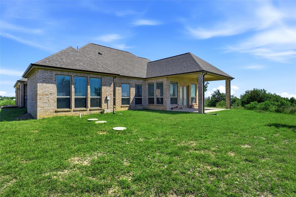 4021 West J E Woody Road Springtown, TX 76082 - Photo 36 of 37 View of back of home