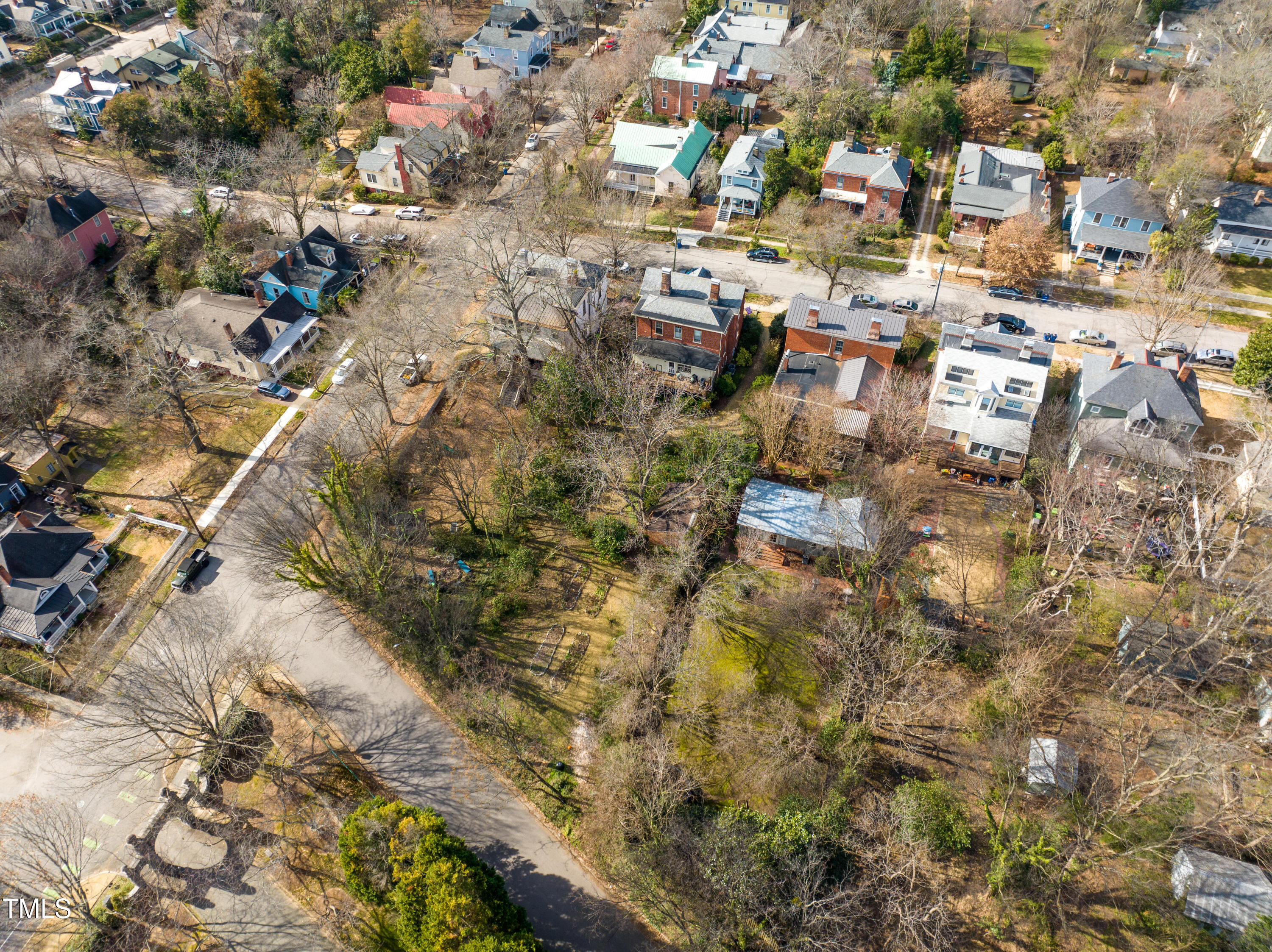 417 Watauga Street Raleigh, NC 27604 - Photo 14 of 27 an aerial view of residential houses with yard