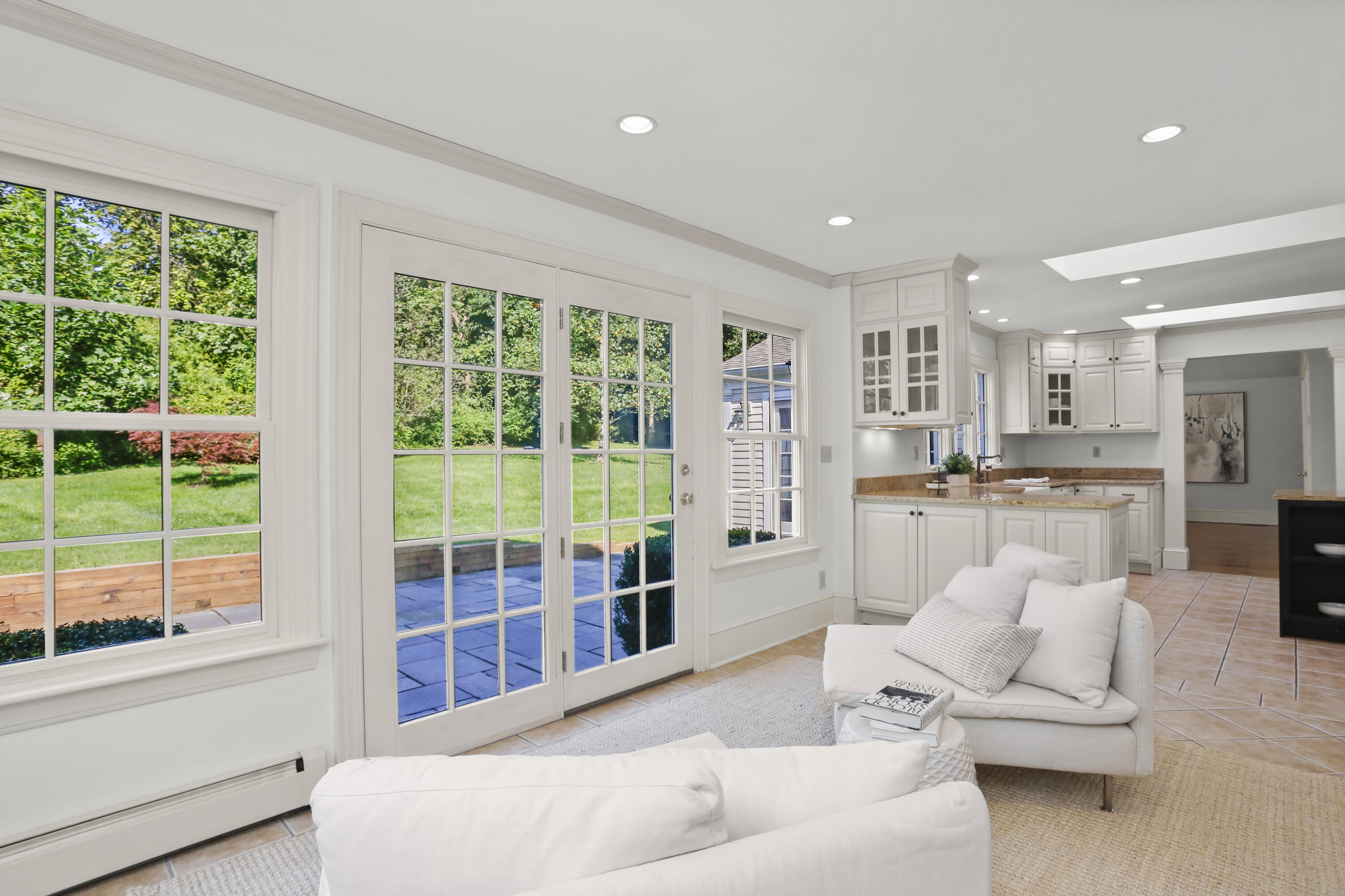 110 Sleepy Hollow Road New Canaan, CT 06840 - Photo 11 of 47 a living room with furniture and a large window