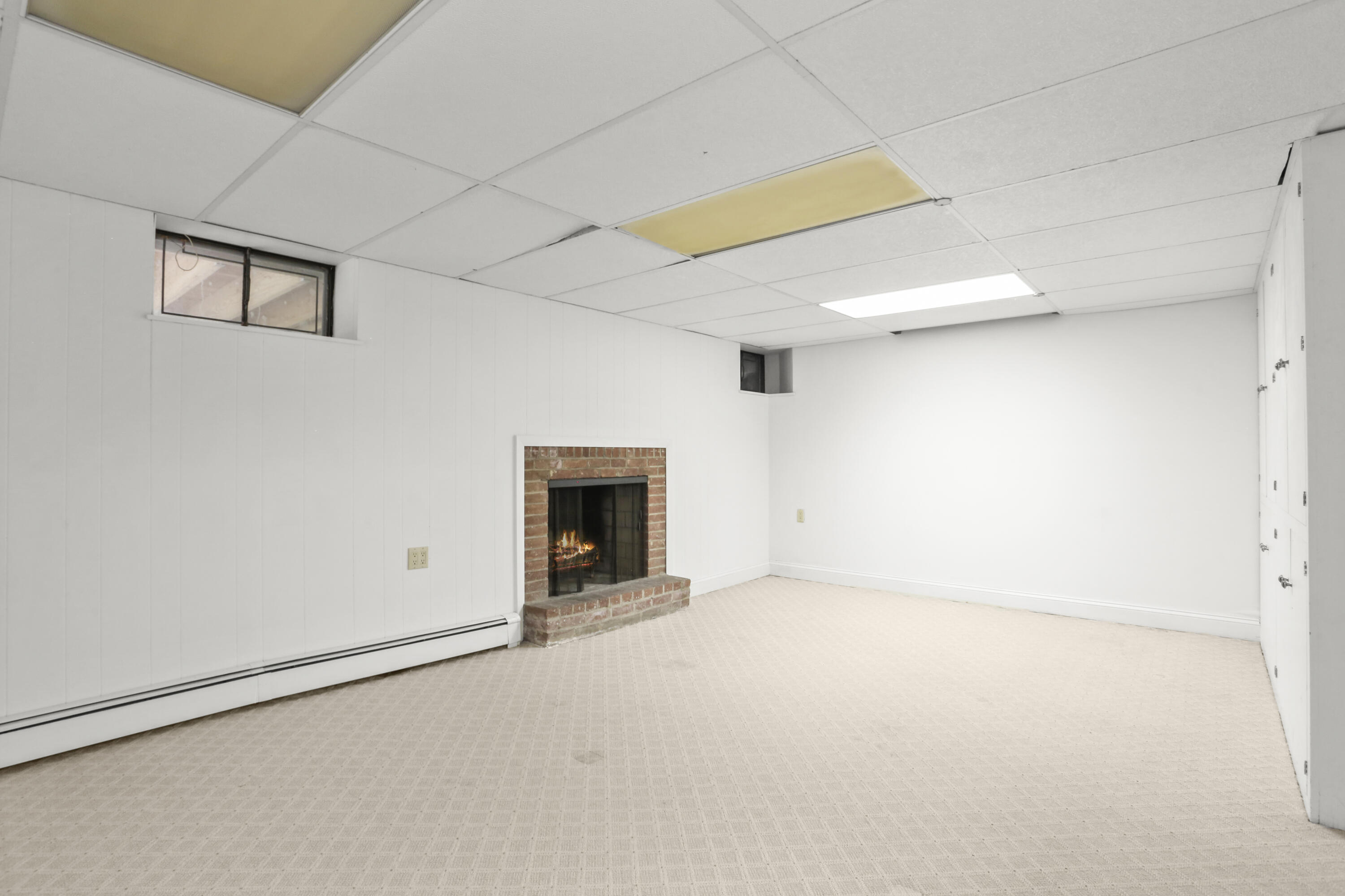 110 Sleepy Hollow Road New Canaan, CT 06840 - Photo 33 of 47 a view of an empty room with a window