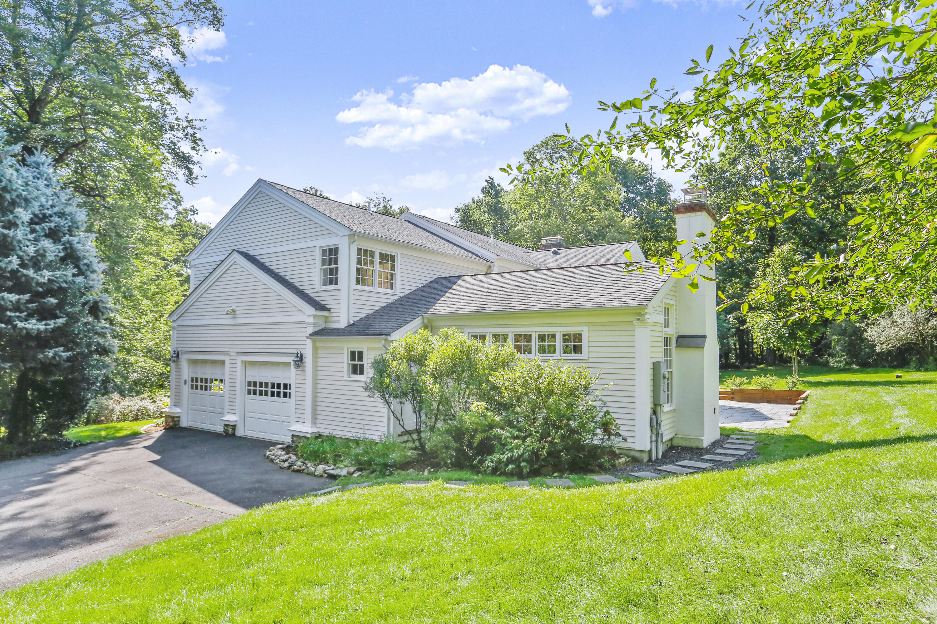 110 Sleepy Hollow Road New Canaan, CT 06840 - Photo 35 of 47 a front view of house with yard and green space