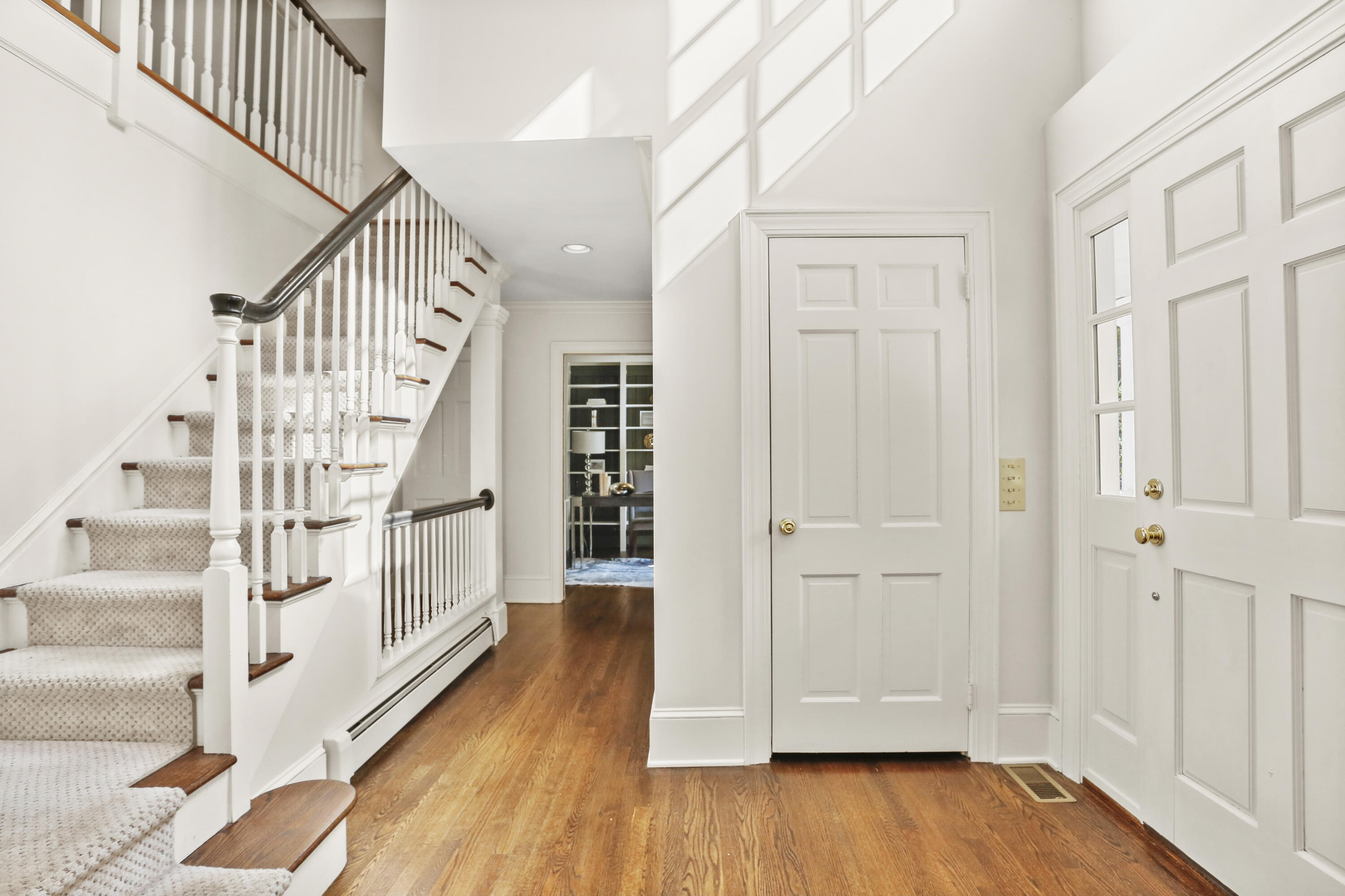 110 Sleepy Hollow Road New Canaan, CT 06840 - Photo 6 of 47 a view of entryway with wooden floor and stairs