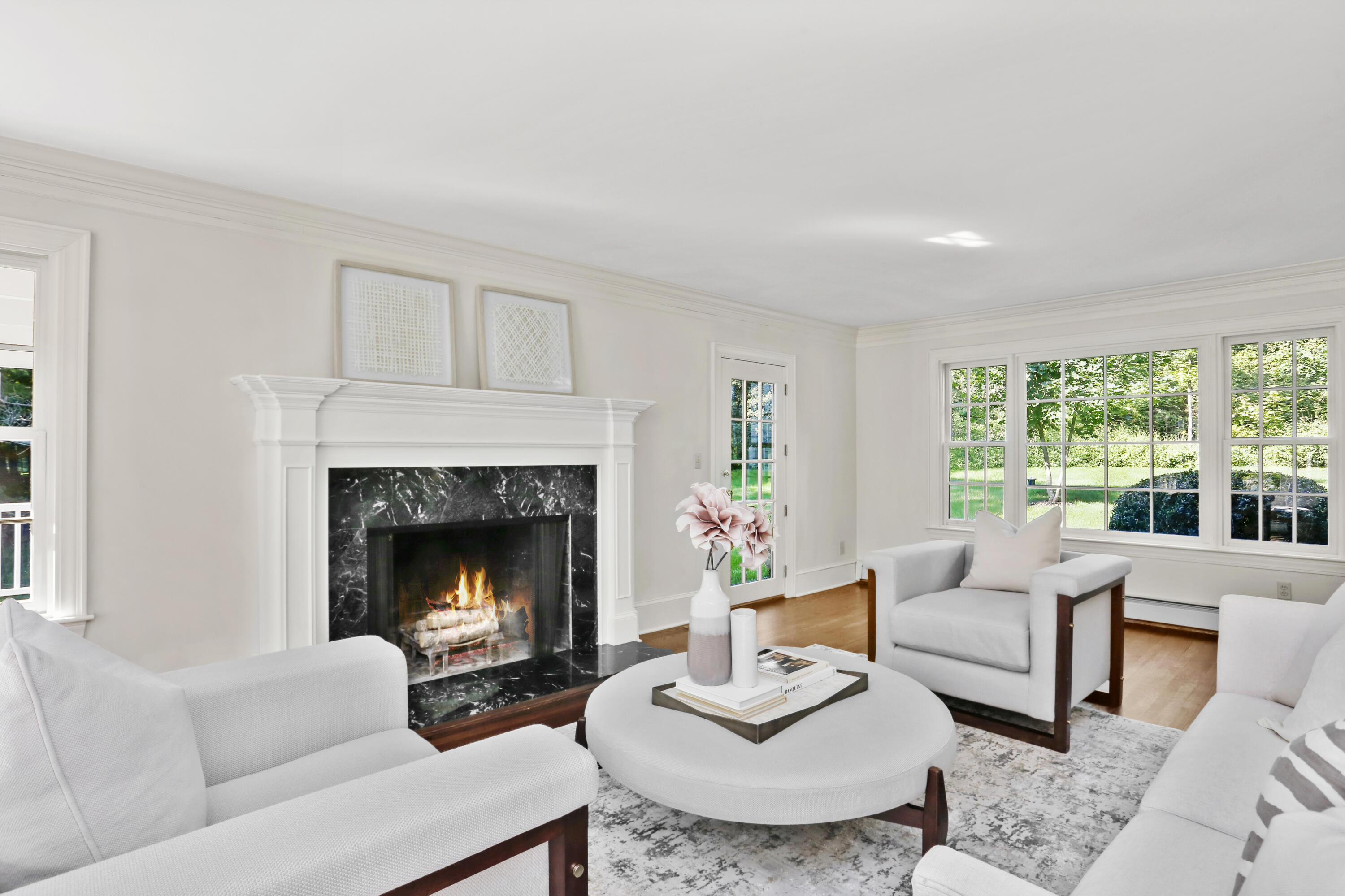 110 Sleepy Hollow Road New Canaan, CT 06840 - Photo 7 of 47 a living room with furniture and a fireplace