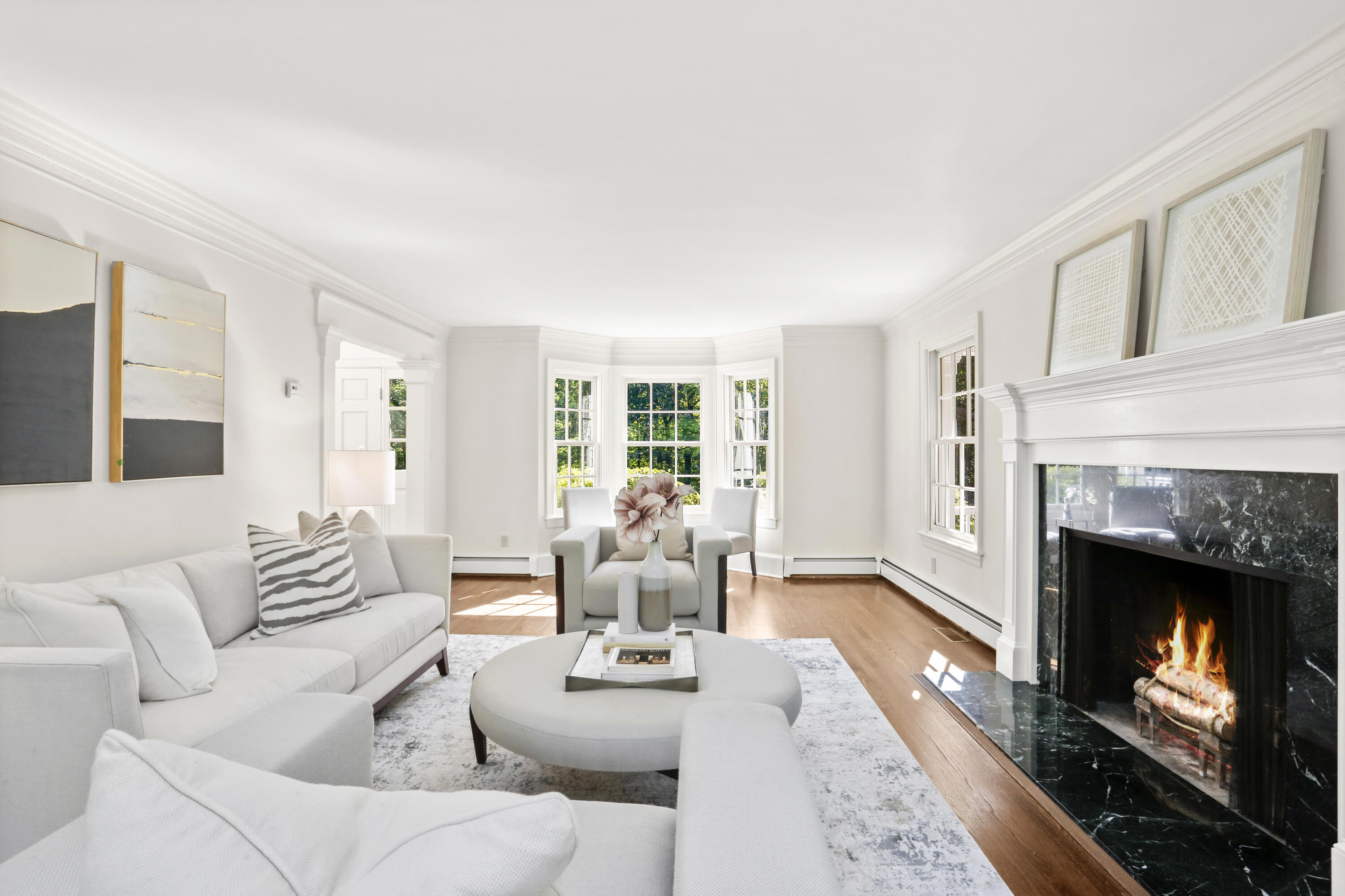 110 Sleepy Hollow Road New Canaan, CT 06840 - Photo 8 of 47 a living room with furniture and a fireplace
