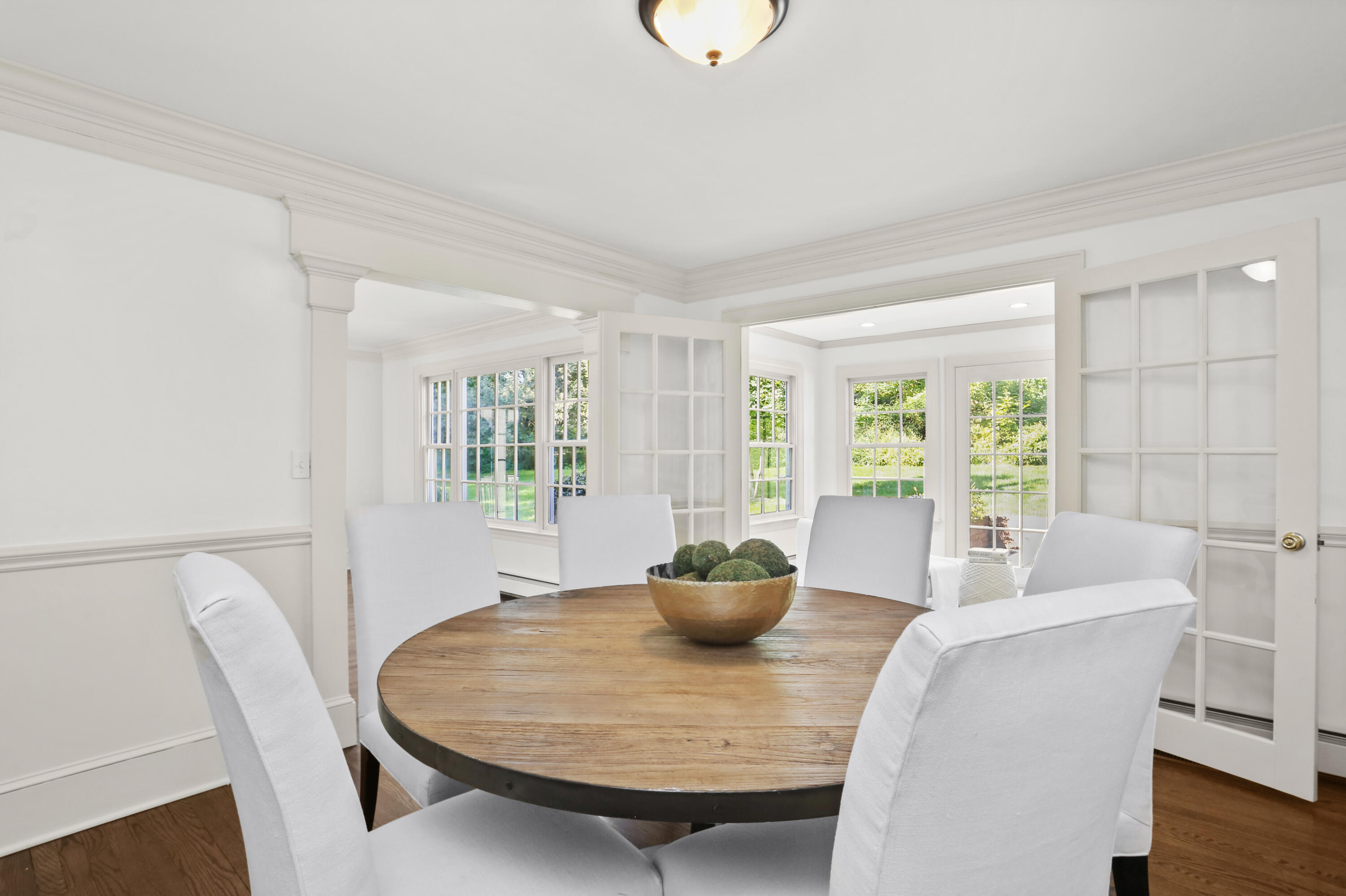 110 Sleepy Hollow Road New Canaan, CT 06840 - Photo 10 of 47 a living room with furniture and a potted plant
