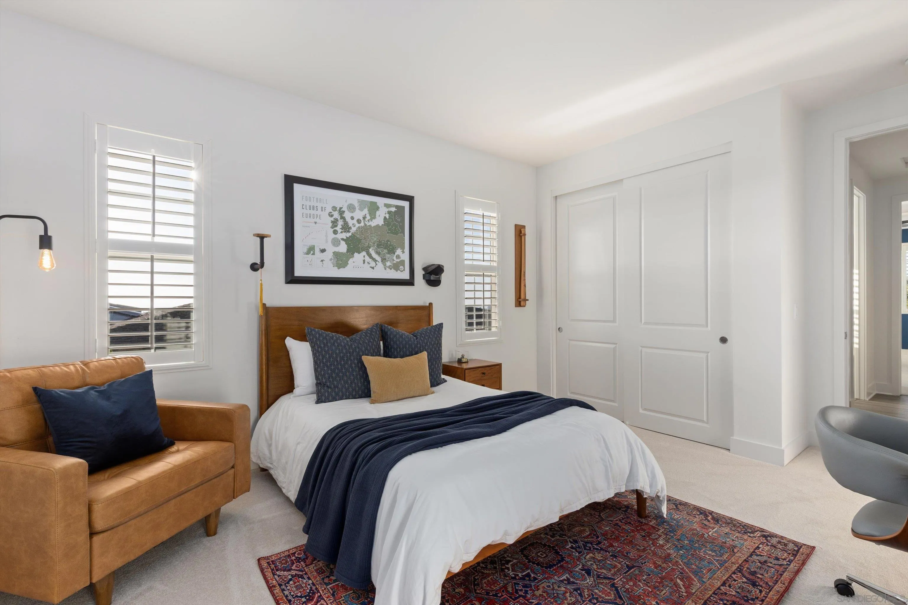 869 Channel Island Drive Encinitas, CA 92024 - Photo 15 of 21 a bedroom with a large bed and a couch