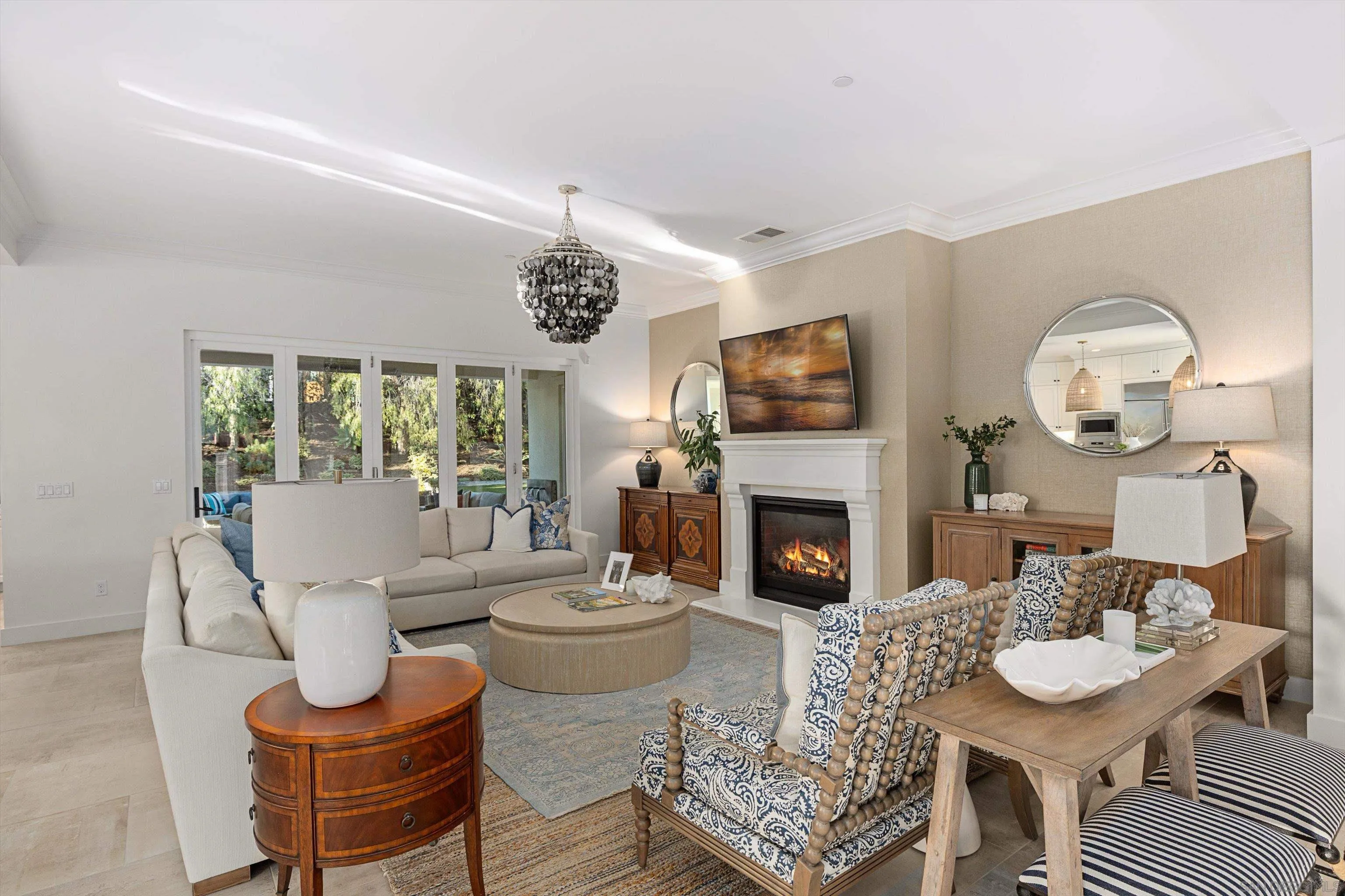 869 Channel Island Drive Encinitas, CA 92024 - Photo 8 of 21 a living room with furniture a fireplace and a large window