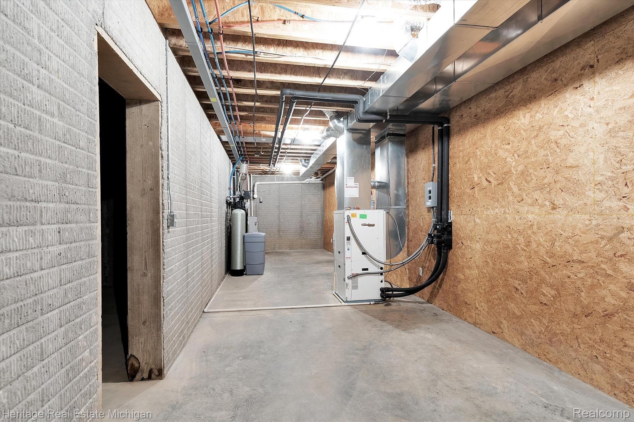 2730 Krouse Road Owosso, MI 48867 - Photo 32 of 45 Basement storage