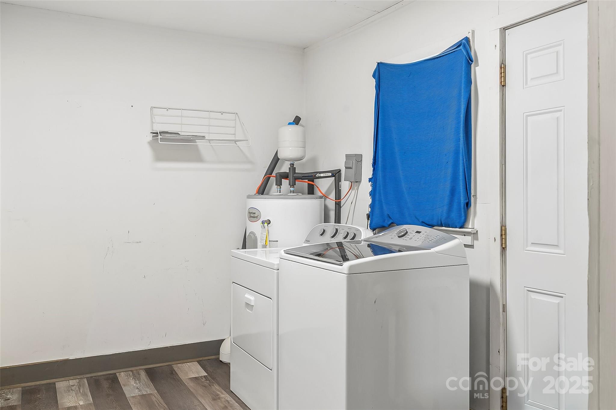 103 Clark Street Marion, NC 28752 - Photo 30 of 34 a utility room with dryer and washer