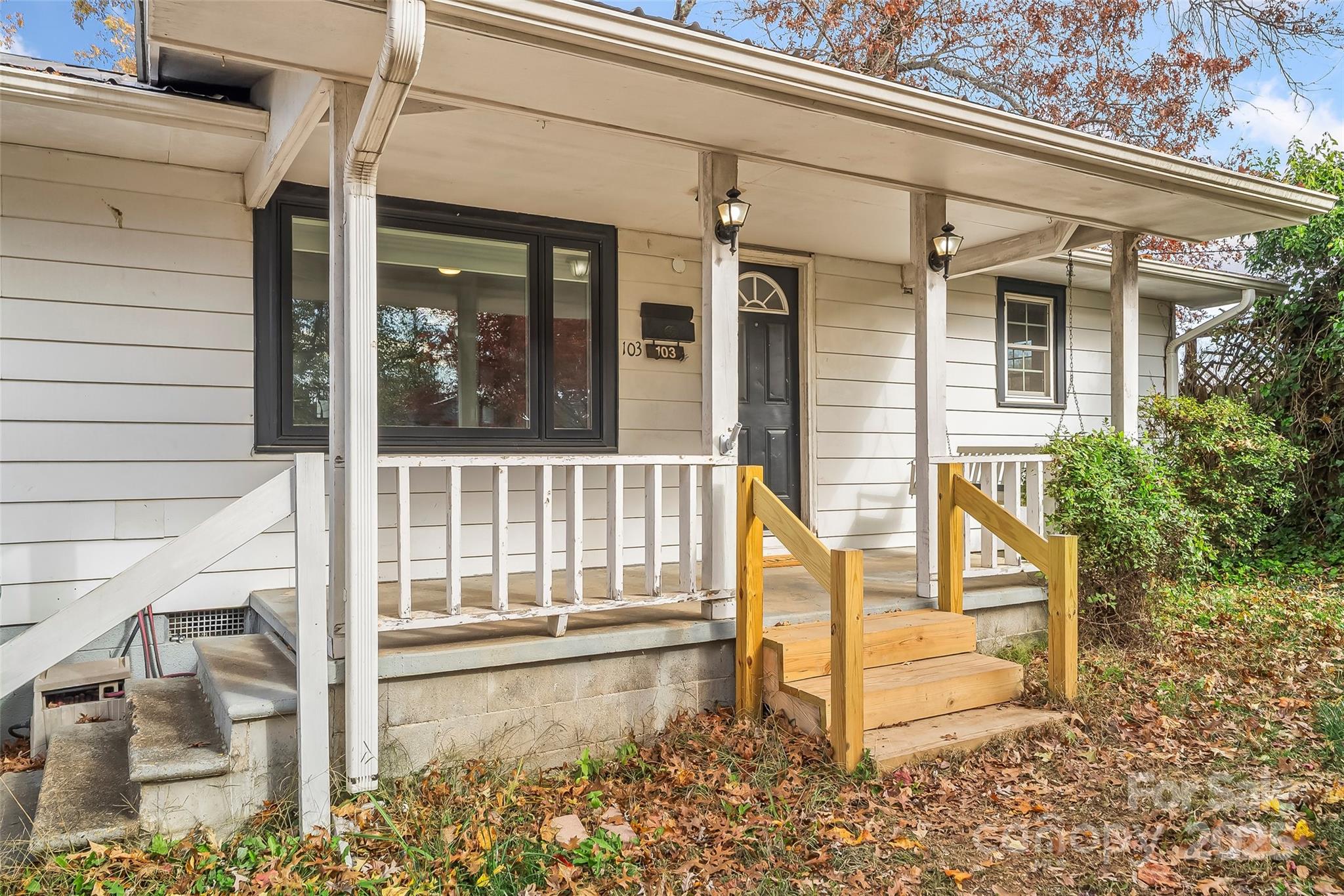103 Clark Street Marion, NC 28752 - Photo 3 of 34 front view of a house with a porch