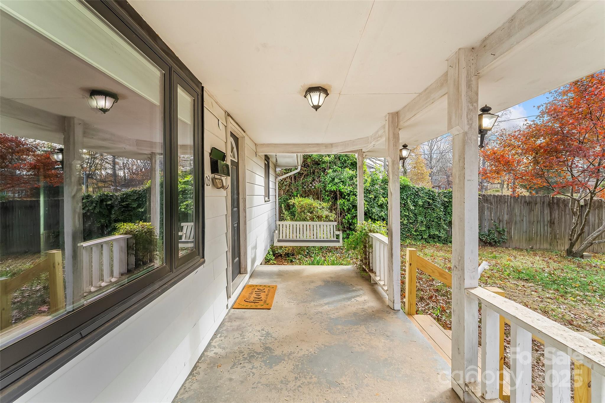 103 Clark Street Marion, NC 28752 - Photo 4 of 34 a house view with a garden space