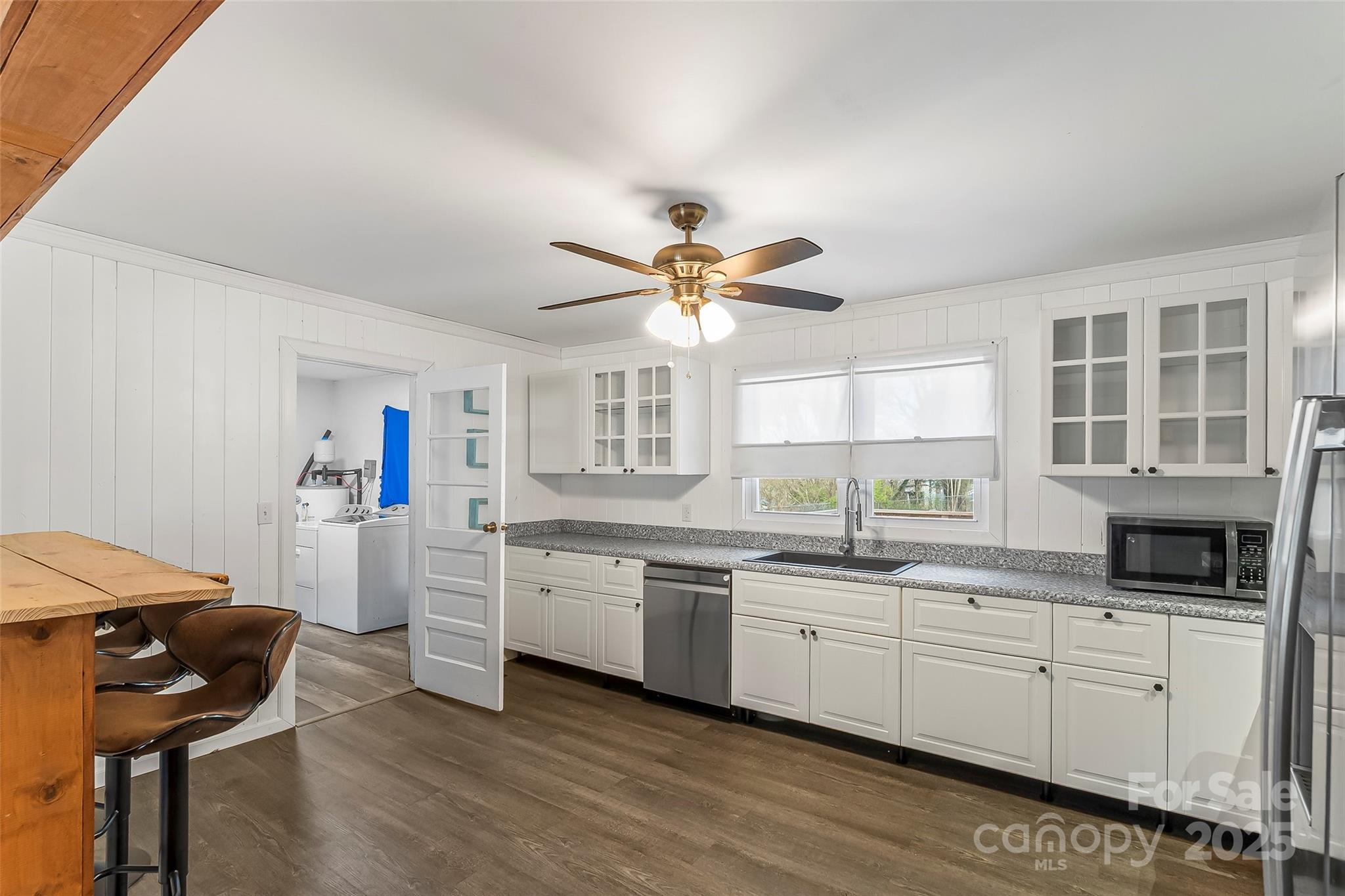 103 Clark Street Marion, NC 28752 - Photo 10 of 34 a kitchen with a sink cabinets and window