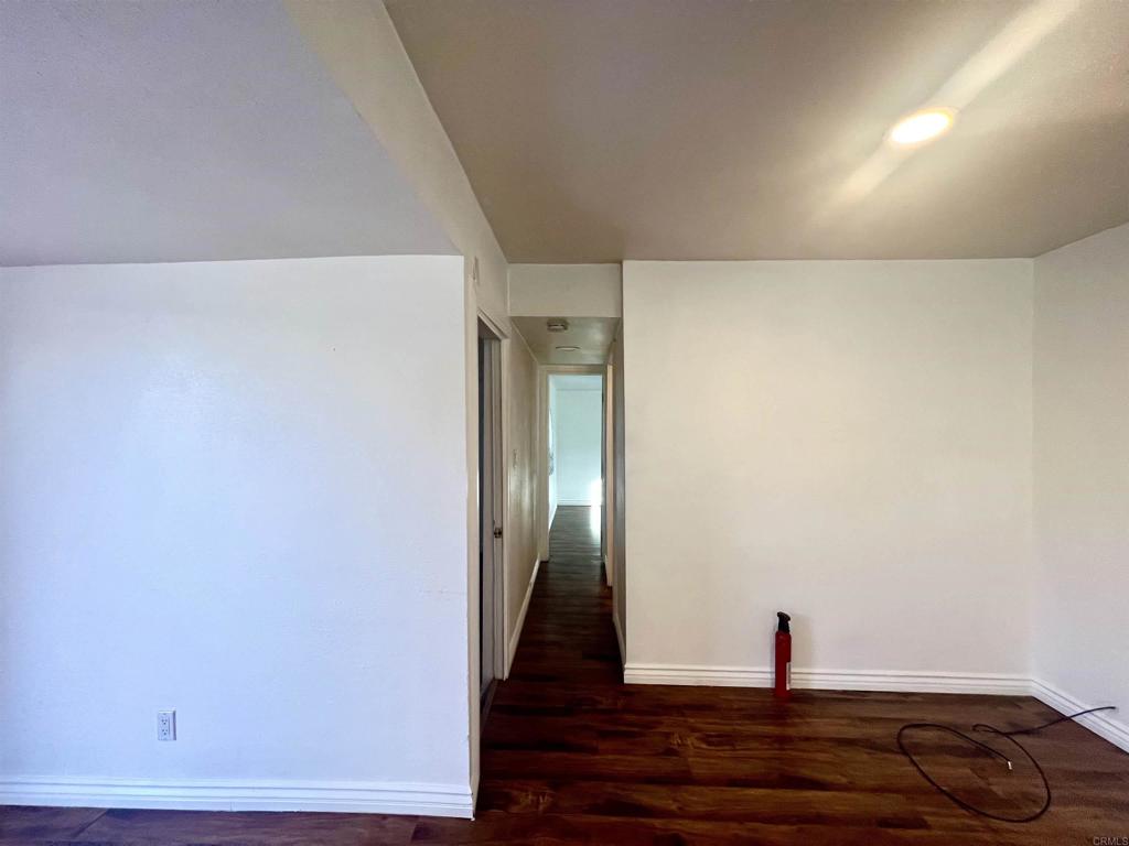 10707 Jamacha Boulevard, Unit 72 Spring Valley, CA 91978 - Photo 7 of 18 a view of empty room with wooden floor