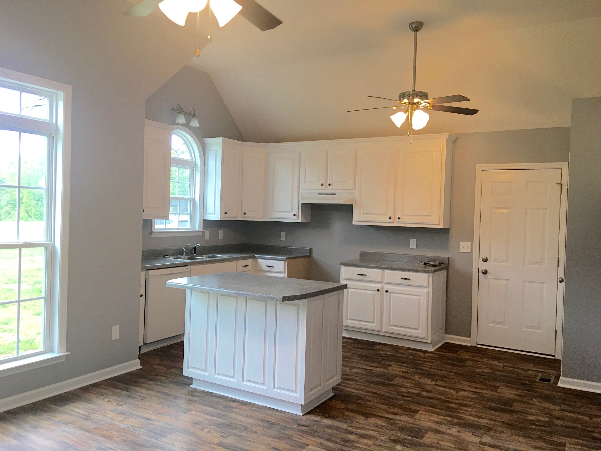 538 B Limestone Road Elora, TN 37328 - Photo 4 of 19 a kitchen with cabinets wooden floor and a window