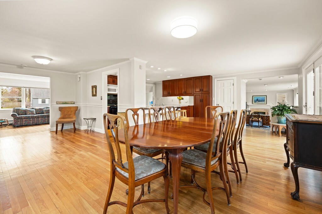 16 Dee Road Lexington, MA 02420 - Photo 11 of 30 a dining room with furniture and wooden floor