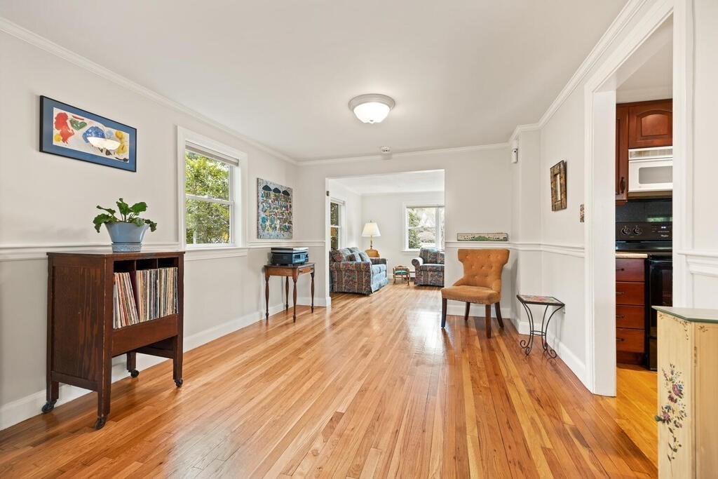 16 Dee Road Lexington, MA 02420 - Photo 13 of 30 a living room with furniture and a wooden floor