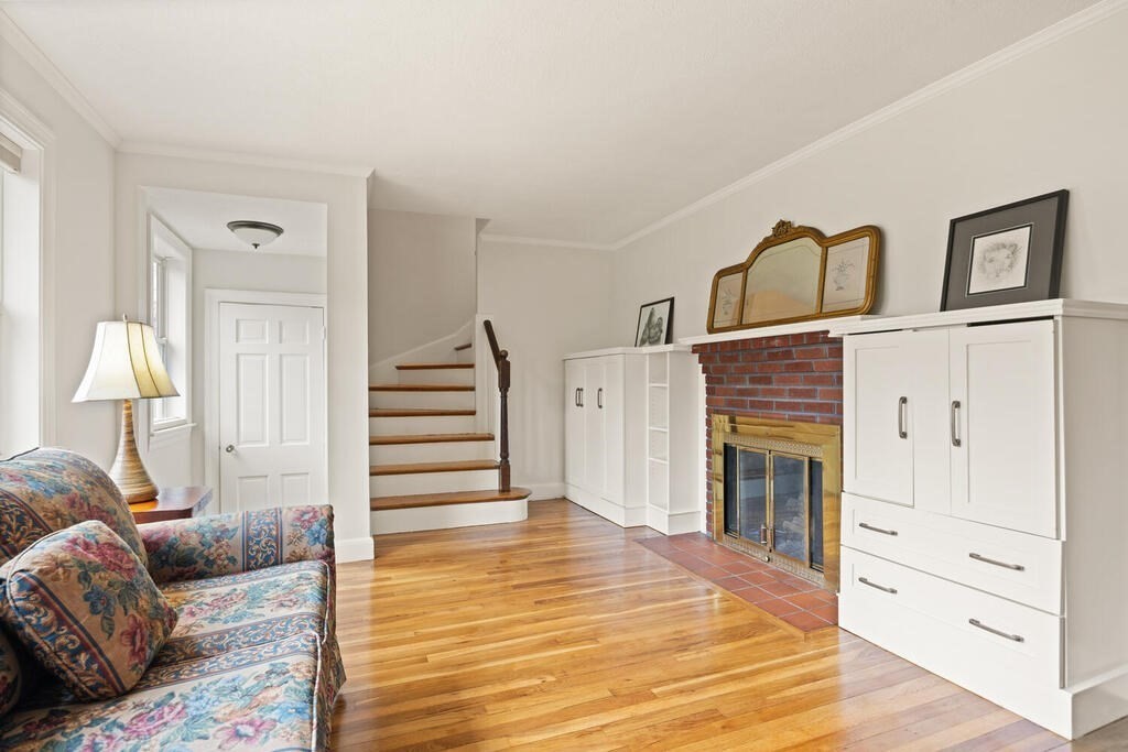 16 Dee Road Lexington, MA 02420 - Photo 15 of 30 a bedroom with a bed and a couch