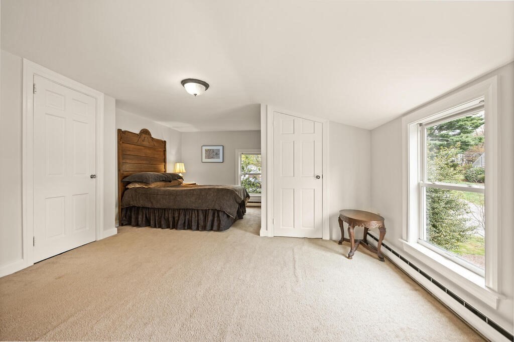 16 Dee Road Lexington, MA 02420 - Photo 21 of 30 a bedroom with a bed and a window