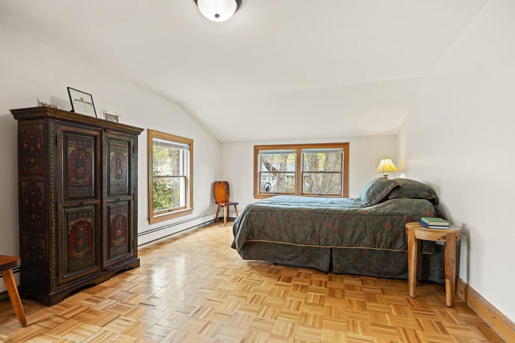 16 Dee Road Lexington, MA 02420 - Photo 22 of 30 a living room with a bed furniture and a window