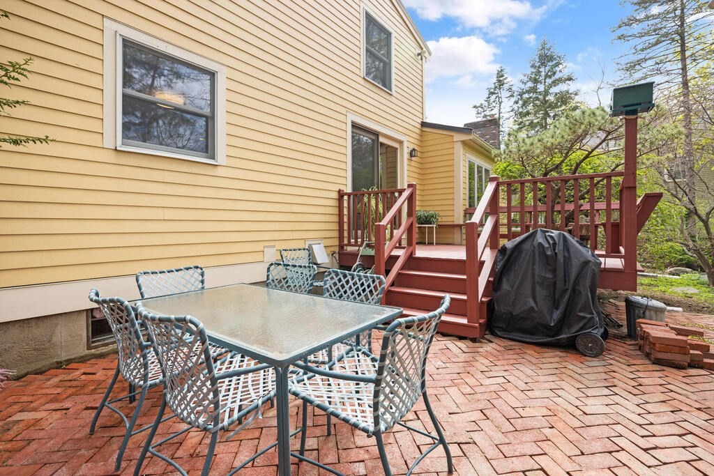 16 Dee Road Lexington, MA 02420 - Photo 27 of 30 a view of a chairs and table in the patio
