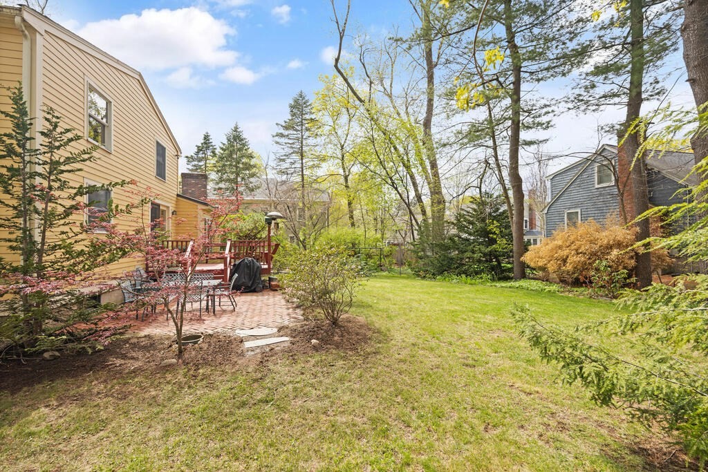 16 Dee Road Lexington, MA 02420 - Photo 28 of 30 a view of a yard with plants and large trees