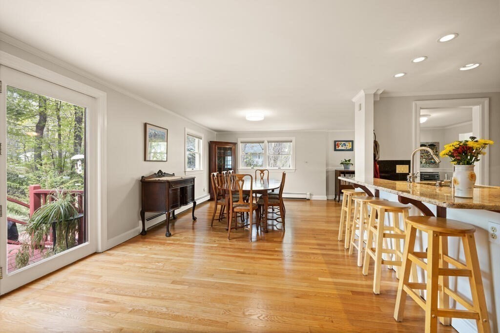 16 Dee Road Lexington, MA 02420 - Photo 6 of 30 a view of a dining room with furniture window and wooden floor