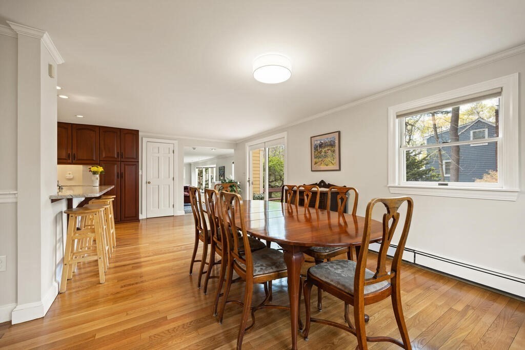 16 Dee Road Lexington, MA 02420 - Photo 10 of 30 a view of a dining room with furniture and wooden floor