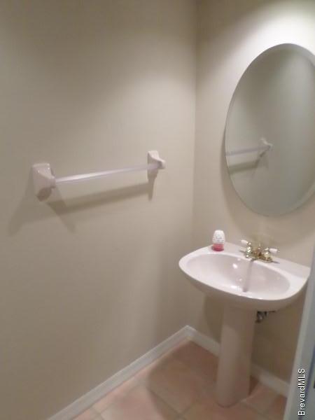 4171 Sparrow Hawk Road Melbourne, FL 32934 - Photo 11 of 35 12b Half Bath by Den (2)