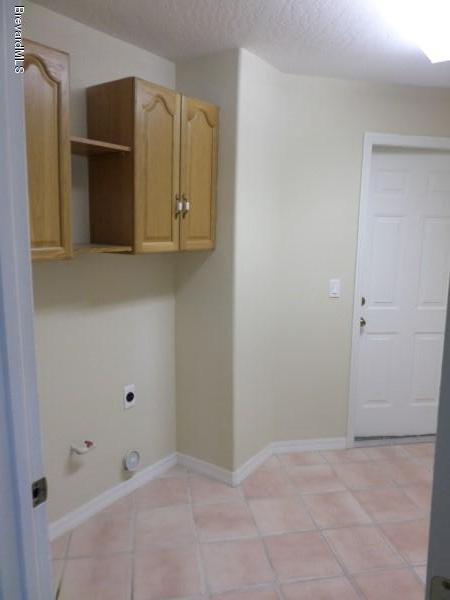 4171 Sparrow Hawk Road Melbourne, FL 32934 - Photo 29 of 35 Laundry Room
